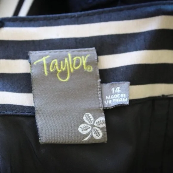 Feminine and Fabulous! Black and Ivory Striped Taylor Dress - Picture 6 of 11